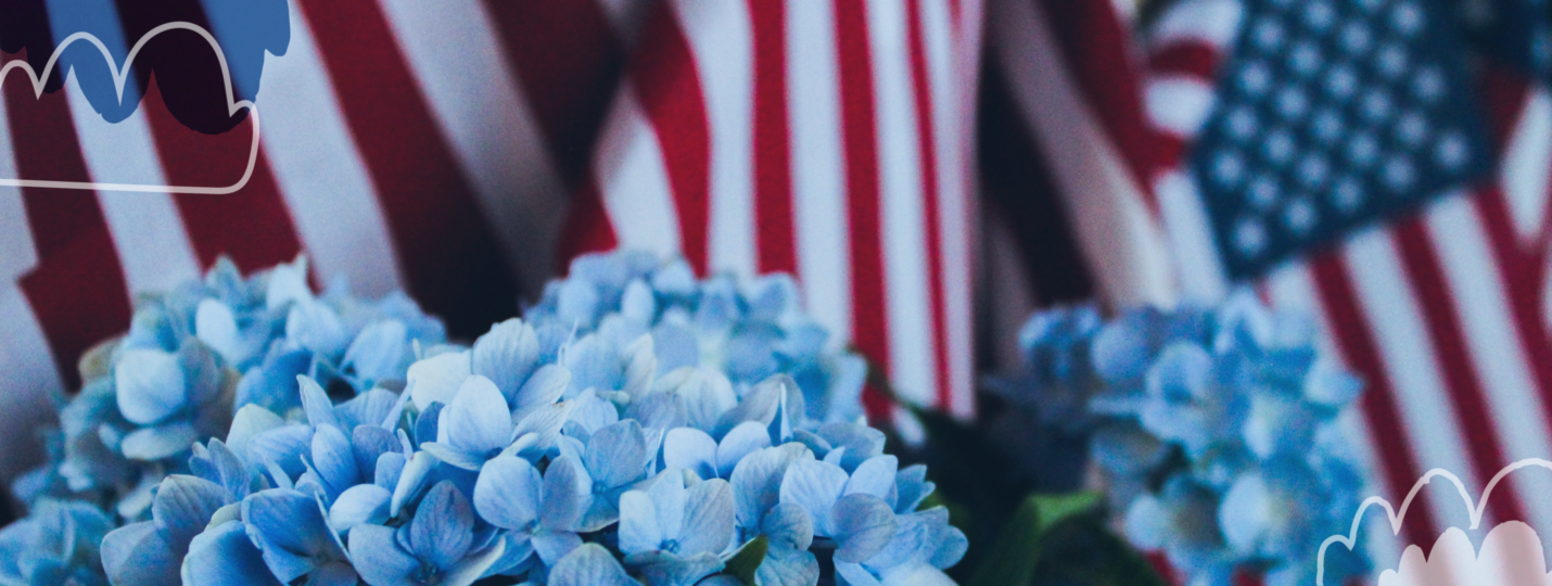 American flag and blue flowers